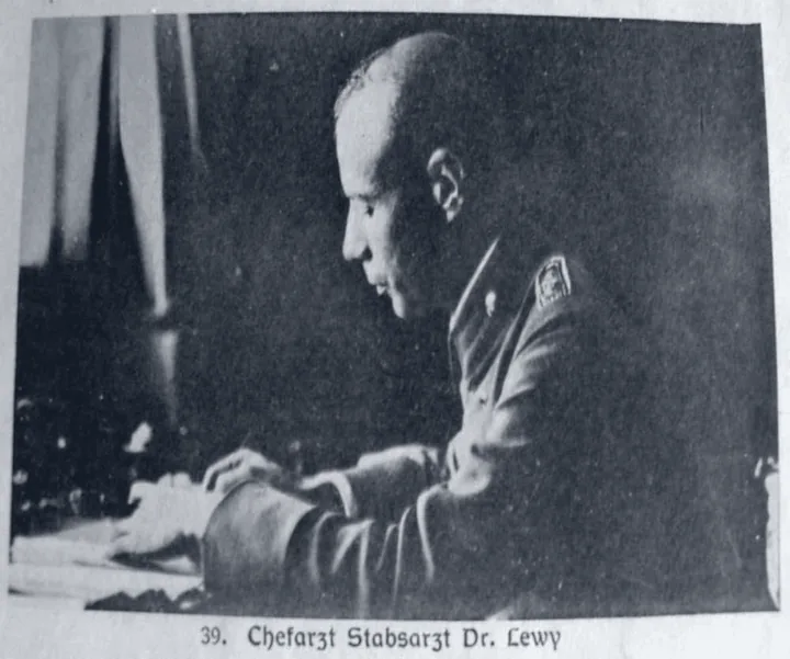Photograph of Friedrich Heinrich Lewy at a desk, around 1920